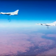 This photo provided by the Russian Defense Ministry Press Service shows Russian air force Tu-22M3 bombers strike the Islamic State group wldtargets in Syria on Tuesday, Jan. 24, 2017. The mission, the third such bombing raid in four days, targeted the Islamic State group around Deir el-Zour in eastern Syria where the Islamic State group has launched an offensive against Syrian government forces. (Russian Defense Ministry Press Service Photo via AP)